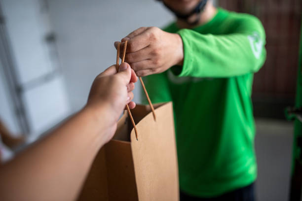 Food Delivery Rider Delivers food stock photo
