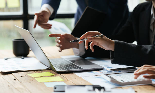 istock Partner meeting business investor working start up project for both company with document data graph, Professional Business teamwork conference project success financial statistics growth profit. 1398229192