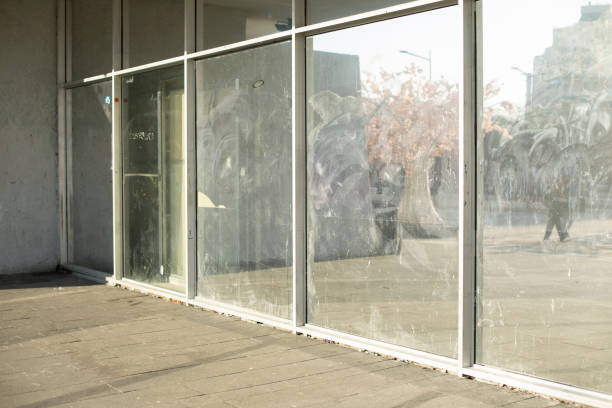 istock Dirty glass in display case. Broken glass in building. 1398240656