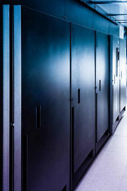 istock row of server cabinets inside data center room 1398243305