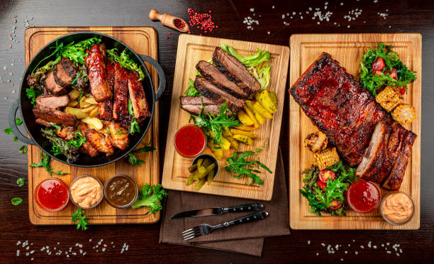 istock Different barbecue meat with potatoes in a frying pan 1398243420