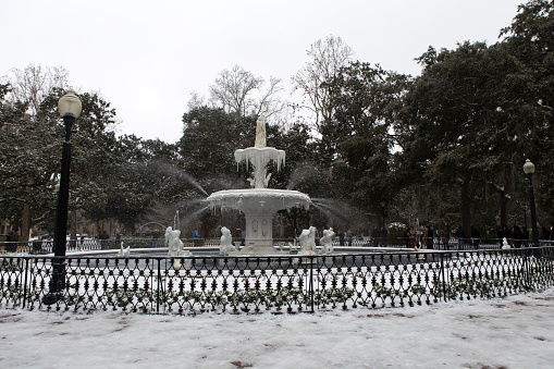 Snow in Savannah, Georgia on January 3rd, 2018. A view of the fountain covered with ice and snow.