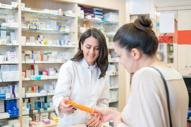 istock Patient Consulting Medicine With Pharmacist 1398244637
