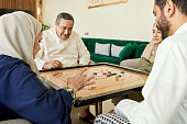istock Riyadh couples playing carrom 1398245717