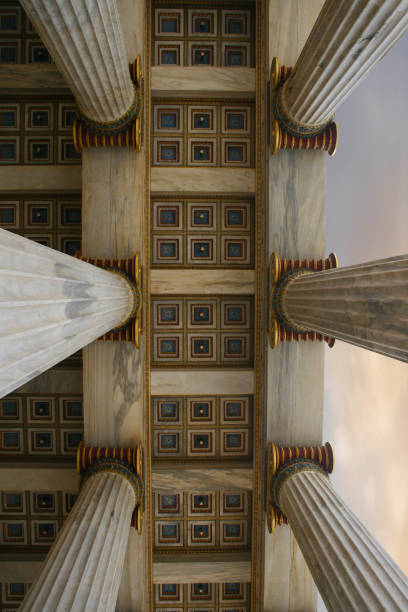 istock Athens Academy a marble column  against a with clouds in Athens, Greece 1398245804