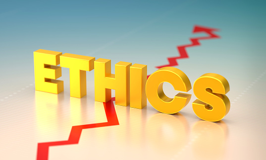Ethics text on financial chart background. Finance and investment concept.