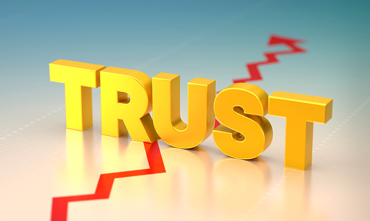 Trust Text on financial chart background. Finance and investment concept.