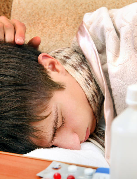 istock Sick Man sleep in the Bed 1398247270