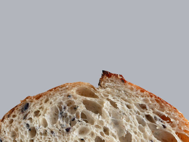 istock Background arts design, close up partial slice homemade sourdough bread , light color background, blank for copy space for ads and sale 1398250146