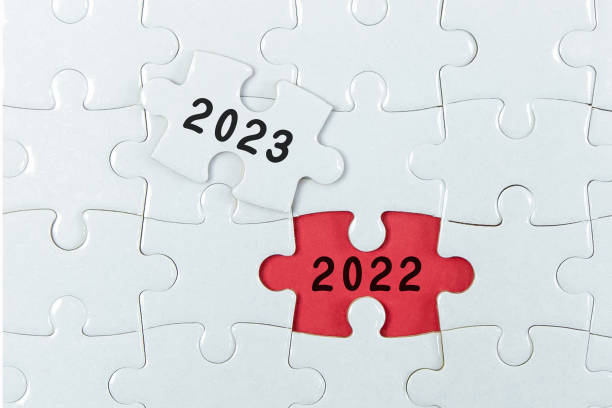 istock 2023, 2023 on puzzle background, business concept. 1398253812