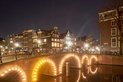 Amsterdam canal bridge at night, The Netherlands