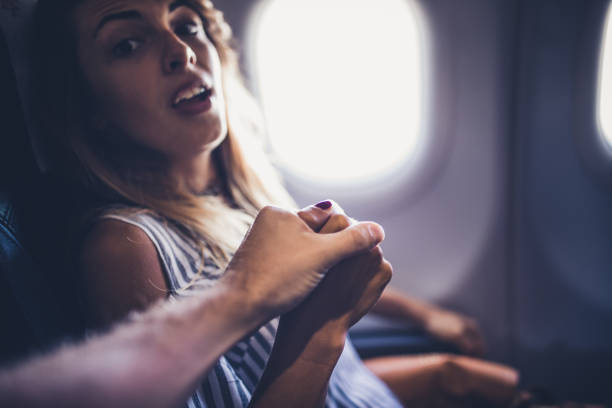 istock Hold my hand, I am scared of flying! 1398256905