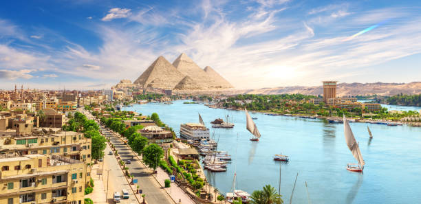 Aswan downtown with sailboats, panoramic view on the Nile, Egypt stock photo
