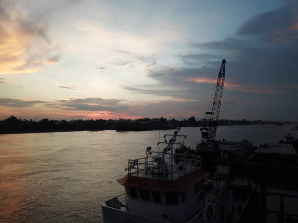 istock Beautiful sunset on river bank 1398259144