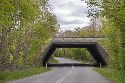 Concrete bridge over a road in the countryside on the Danish peninsular Jutland