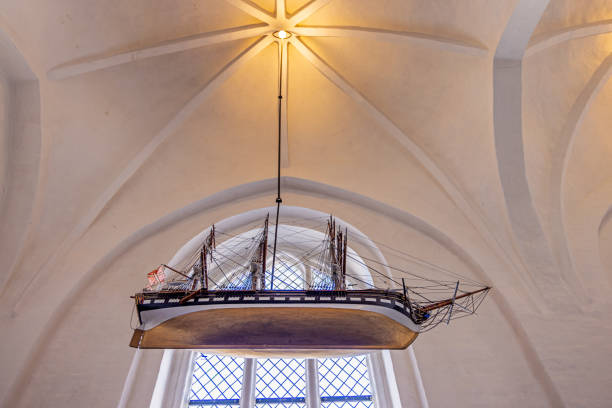 Old model of a sailing ship in Ribe Domkirke, which is the oldest cathedral in Denmark. A great part of the building is from 1134 but it has been changed during the years. It is situated in Ribe town, which is the oldest town in Denmark and placed in the south western part of the peninsular Jutland