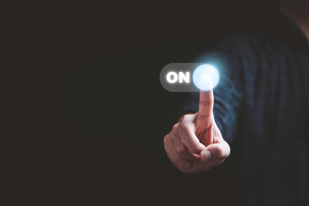 istock Businessman touching to virtual toggle switch button for change from off to on. 1398265974