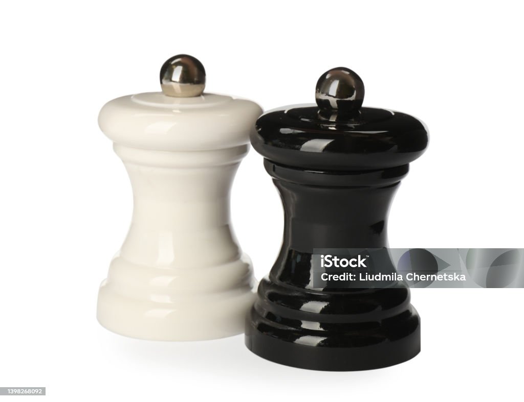 Wooden salt and pepper shakers isolated on white. Spice mill Cut Out Stock Photo