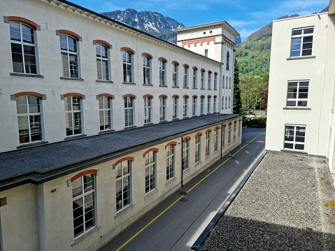 Ziegelbrücke with the former Fritz & Caspar Jenny AG. It was a spinning and weaving factoring established in 1833, and which is part of the Inventory of Swiss Heritage Sites. In 2012 the buildings where modernized and contain now several different companies. The image was captured during springtime.