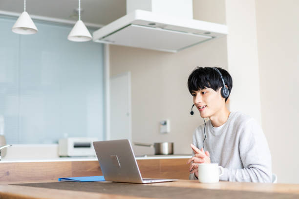 A man works remotely from home