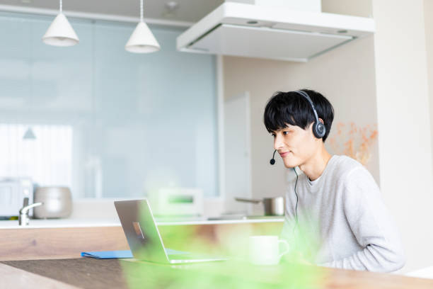 istock A man works remotely from home 1398274528