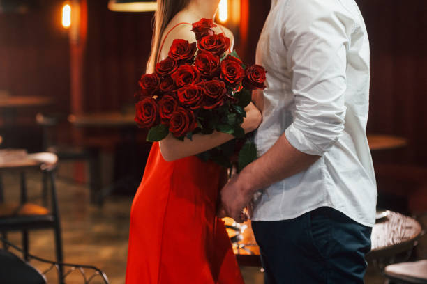 istock Embracing each other. Romantic couple have dinner in the restaurant 1398276883