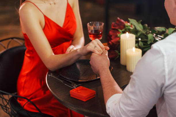 istock With drinks. Romantic couple have dinner in the restaurant 1398277216