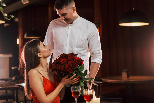 istock Cute romantic couple have dinner in the restaurant 1398278466