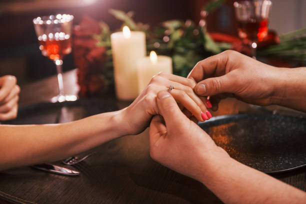 istock Close up. Romantic couple have dinner in the restaurant 1398278547