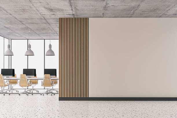 istock Empty office interior with copy space and work desks on terrazzo floor and paneled wall 1398279224