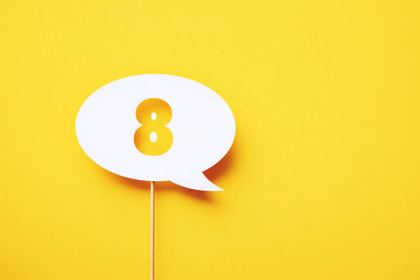 istock Number 8 Written Circular White Chat Bubble Sitting On Yellow Background 1398281902