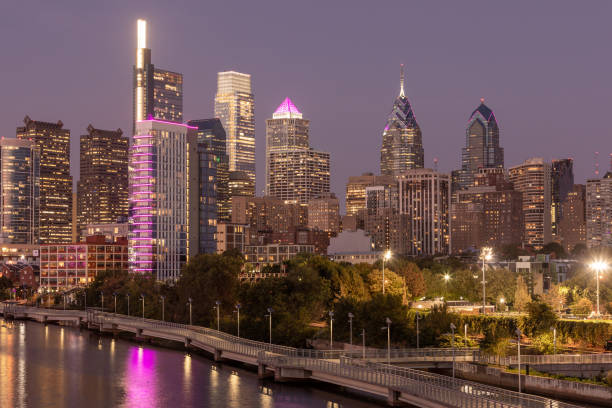 istock Philadelphia Downtown skyline at Night with the Schuylkill river. Beautiful Sunset Light. Schuylkill River Trail in Background. City skyline glows under the beautiful sunset light. Cityscape. PA, USA. 1398284427