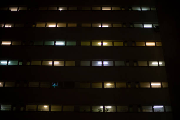 istock Windows in building at night. Light in house. 1398287086