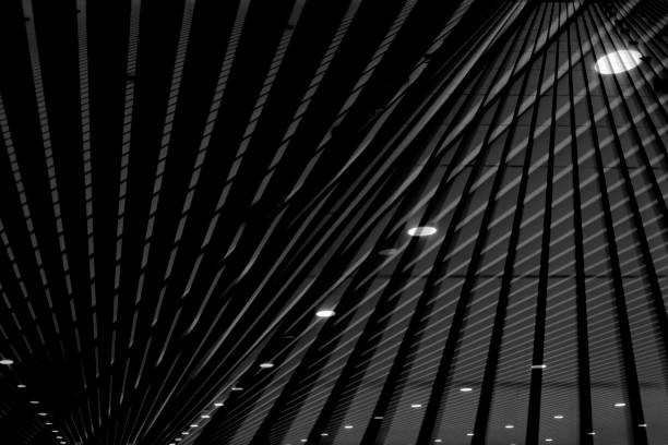 The architectural abstract lines made of by the floors of this atrium located in the common area inside of a 20-floor residential condominium tower.  I shot this image from the upper floors in the hallway areas common to the members and guests of the homeowner's association and provided a metal print to them currently on display in their lobby in exchange for the property release on file signed by a board-member of the association representing the owners of the individual residences contained within the building.  The exact location of the building is on the property release.