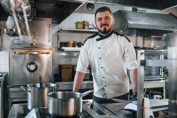 istock With professional tools. Professional chef preparing food in the kitchen 1398287344
