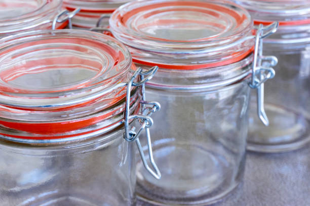 istock Closeup of empty glass canning jars 1398287829