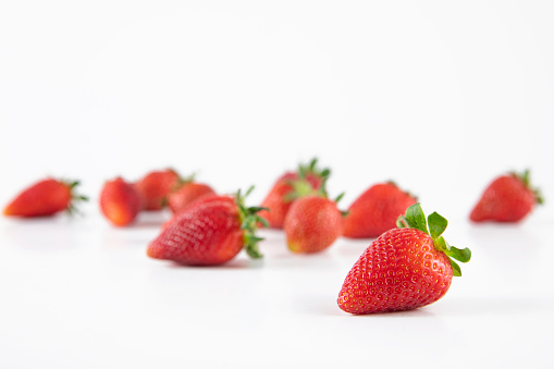 Group of fresh strawberries on white background