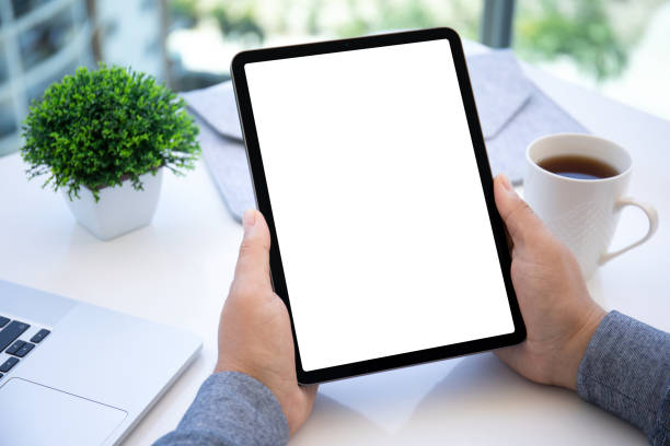 istock male hands hold computer tablet upright with isolated screen 1398296515