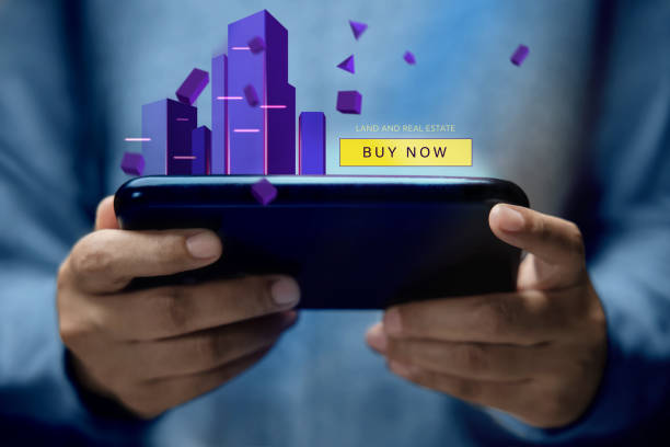 Using Mobile Phone to Buying Land or Real Estate in the NFT Market .Virtual World, Metaverse, Web3 and Blockchain Concepts. Investment in a New Technology. Futuristic Conceptual Photo stock photo