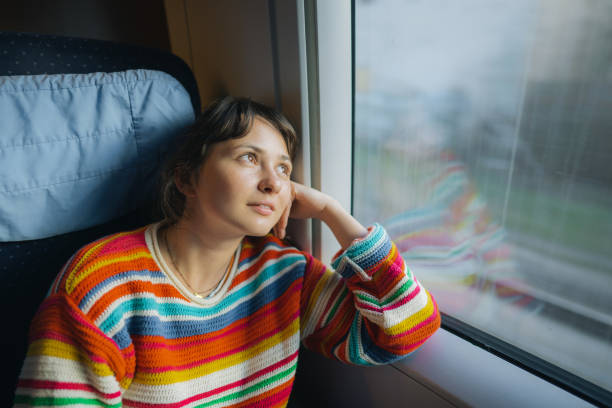 istock Woman traveling in the train 1398303645
