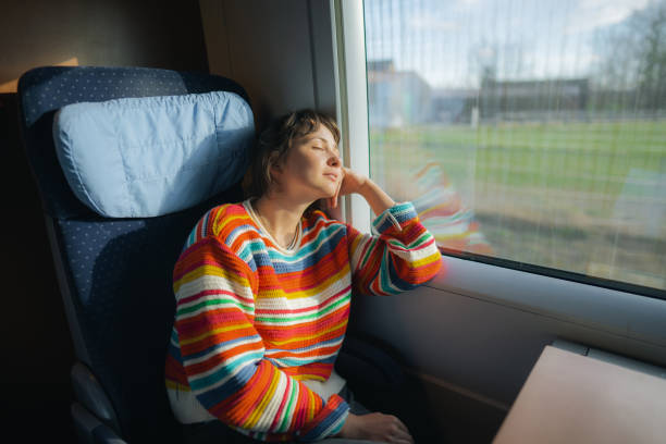 istock Woman traveling in the train 1398303717