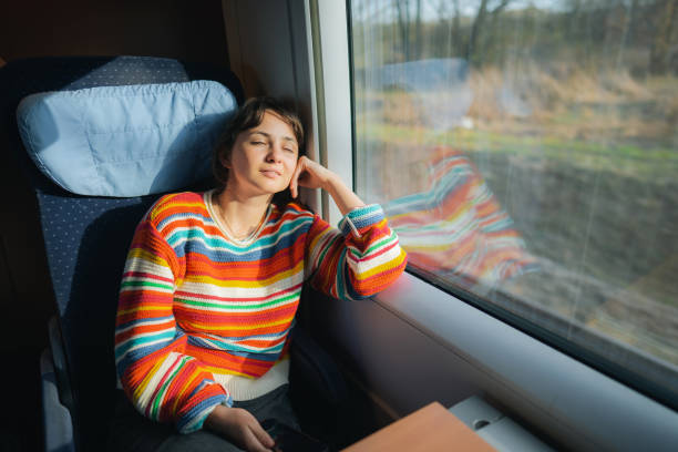 istock Woman traveling in the train 1398303748