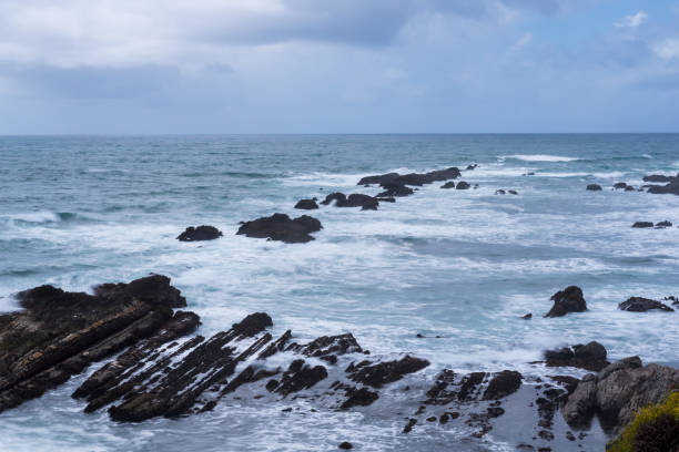 istock Row of rocks in the ocean 1398307764