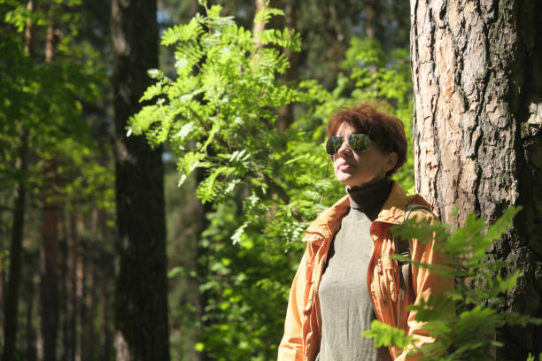 istock Woman in park 1398308737