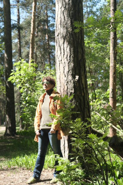 istock Woman in park 1398308775