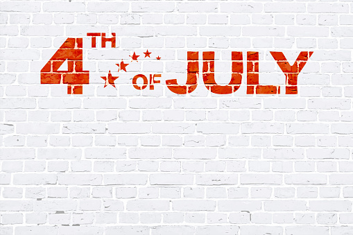 Vector illustration of painted text 4 th of July on a horizontal vector white brick wall. Apt for use as wallpapers, posters, backdrops, banners, greeting cards templates or patriotic t shirt designs for US Independence Day, 4th of July. There is No people and no text and ample copy space.