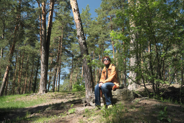 istock Woman in park 1398308850