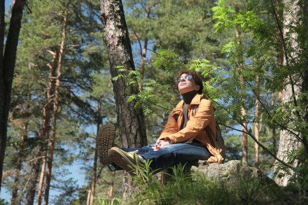 istock Woman in park 1398308870