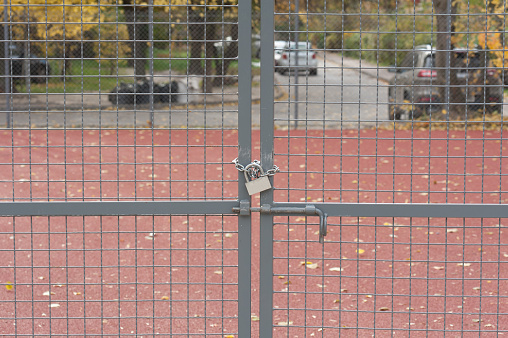 Locked iron fence.