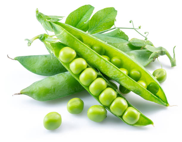 istock Perfect green peas in pod isolated on white background. 1398310826